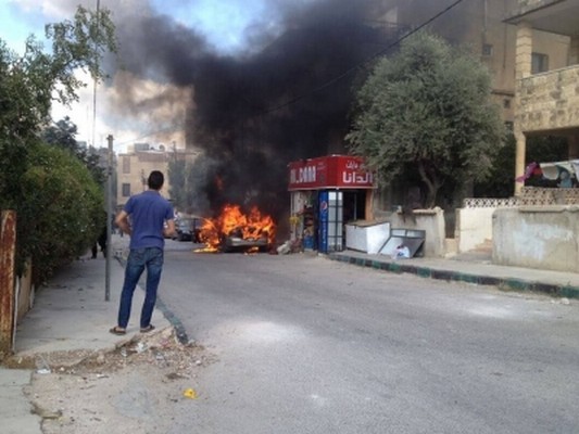 شاهد بالصور...حريق سيارة بالكامل بمنطقة البارحة في محافظة اربد