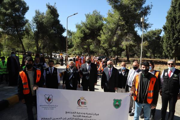 احتفالاً بالمئوية وعيد ميلاد الملك .. تنمية وخدمة المجتمع في الأردنية يزرع 100 شجرة