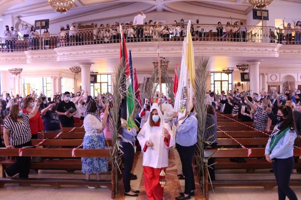 مسيحيو الأردن يحتفلون بأحد الشعانين في الكنائس بعد انقطاع