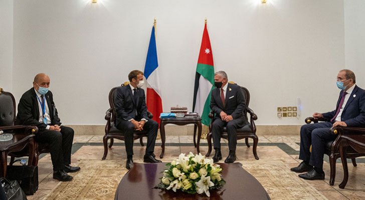 الملك يلتقي الرئيس الفرنسي في بغداد