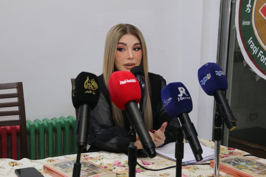 سارة طالب السهيل تحاضر عن العنف ضد المرأة..صور